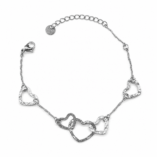 Pulsera plateada con aros texturizados