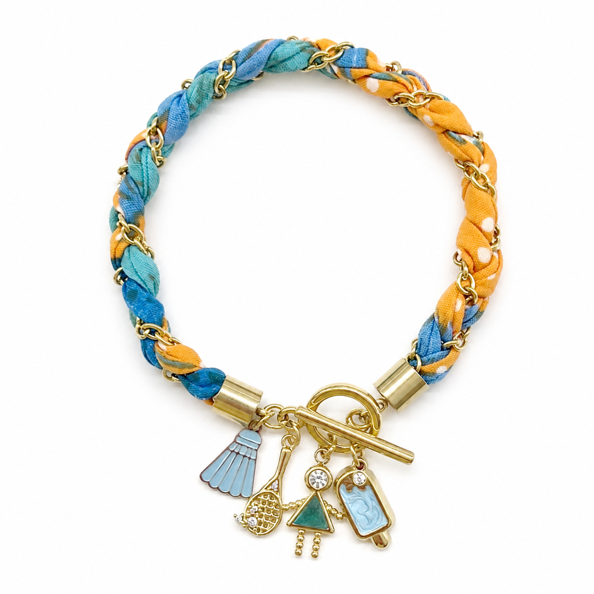 Pulsera collar dorado con tela floral y dijes femeninos