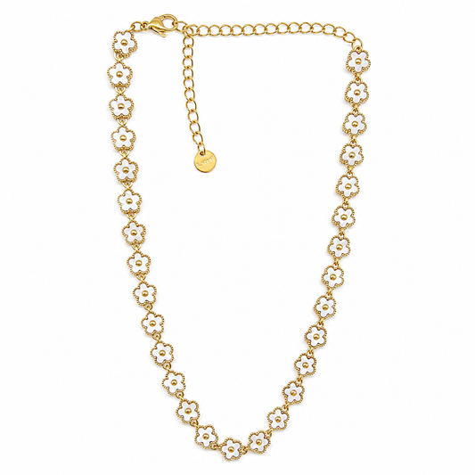 Collar dorado con flores blancas esmaltadas