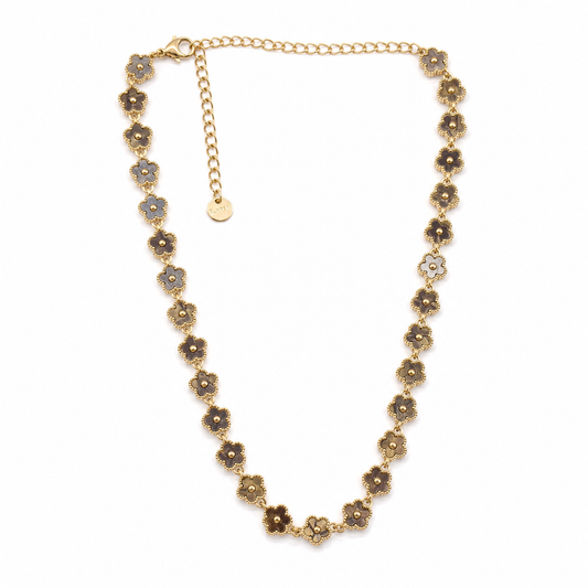 Collar dorado con flores grises esmaltadas