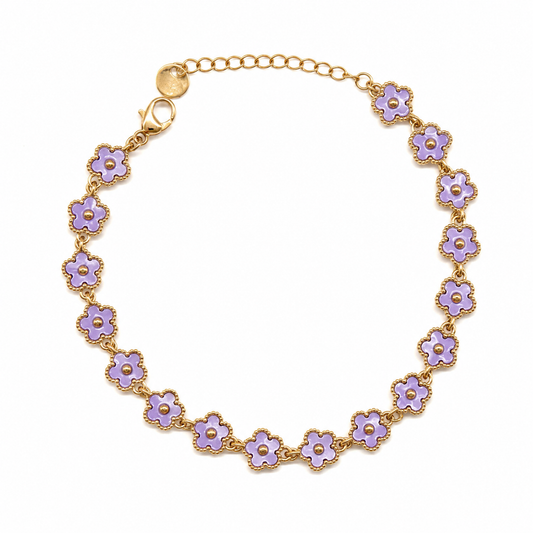 Pulsera dorado con flores celeste