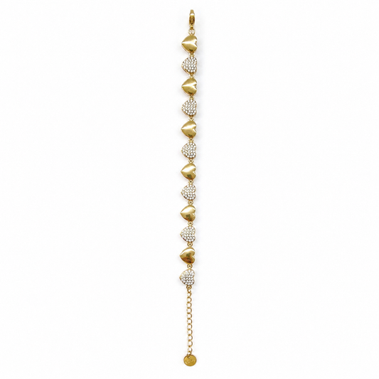 Pulsera dorada con corazones lisos y brillantes
