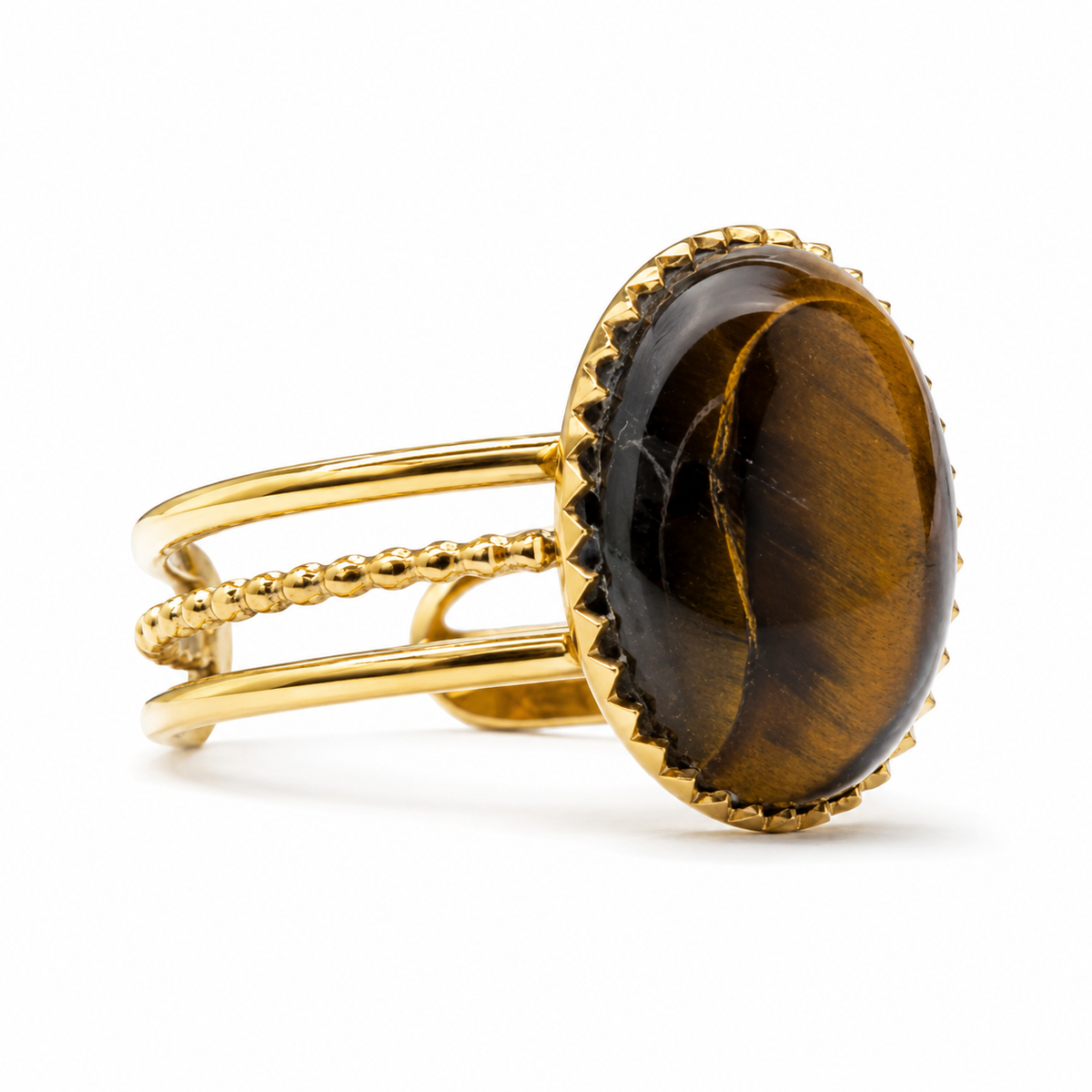 Anillo dorado con piedra verde ojo de tigre ovalada