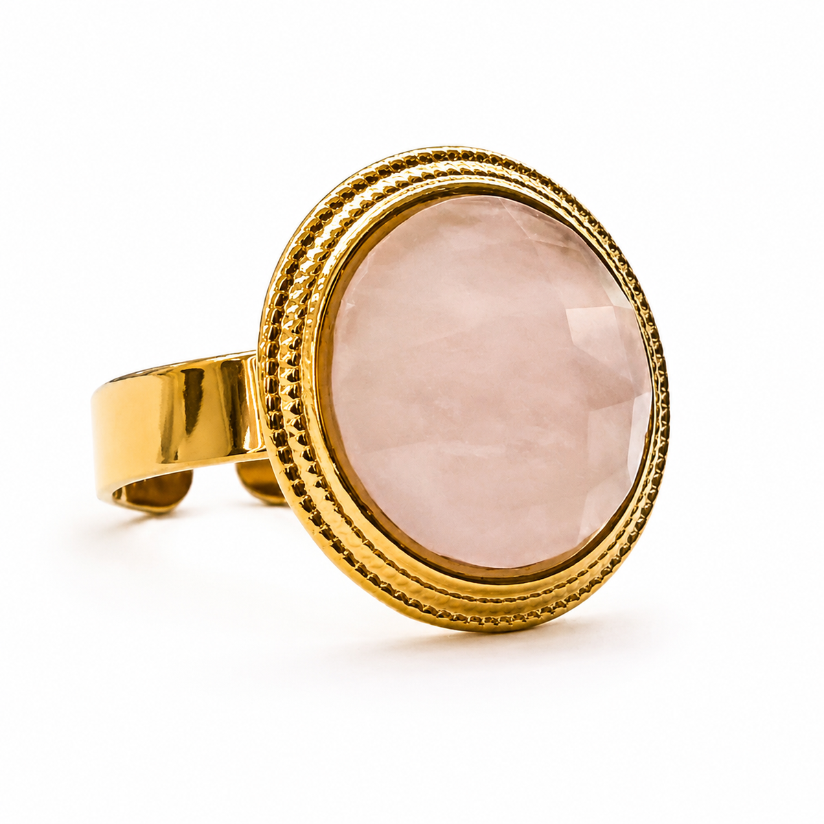 Anillo dorado con piedra cuarzo rosa ovalada facetada