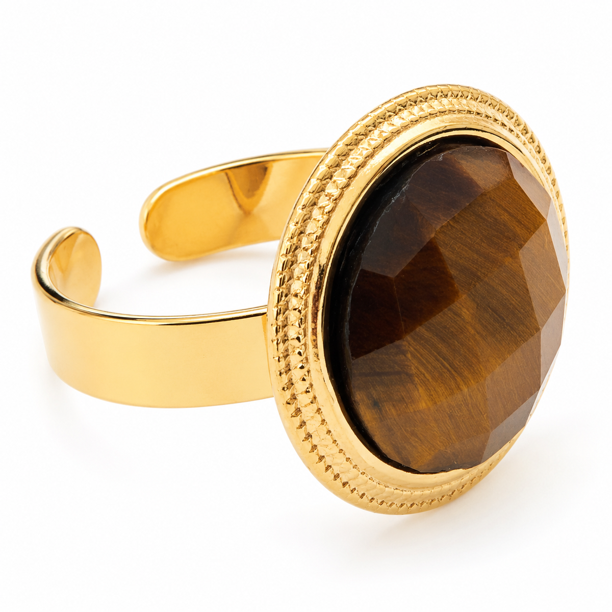 Anillo dorado con piedra ojo de tigre facetada