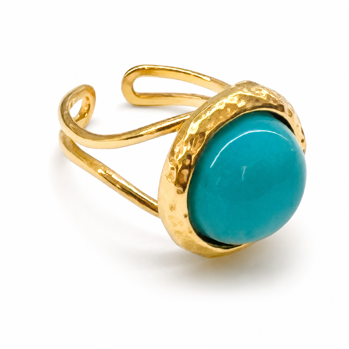 Anillo dorado con piedra aguamarina