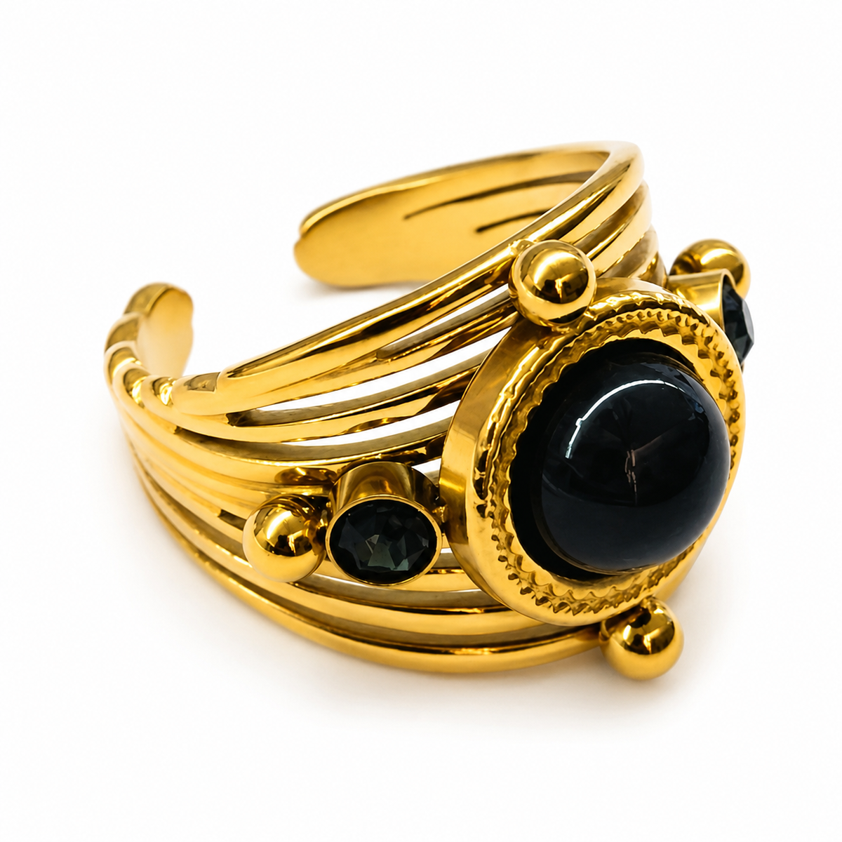 Anillo dorado ancho con piedra Gris