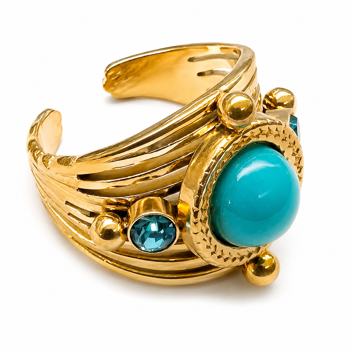 Anillo dorado ancho con piedra turquesa