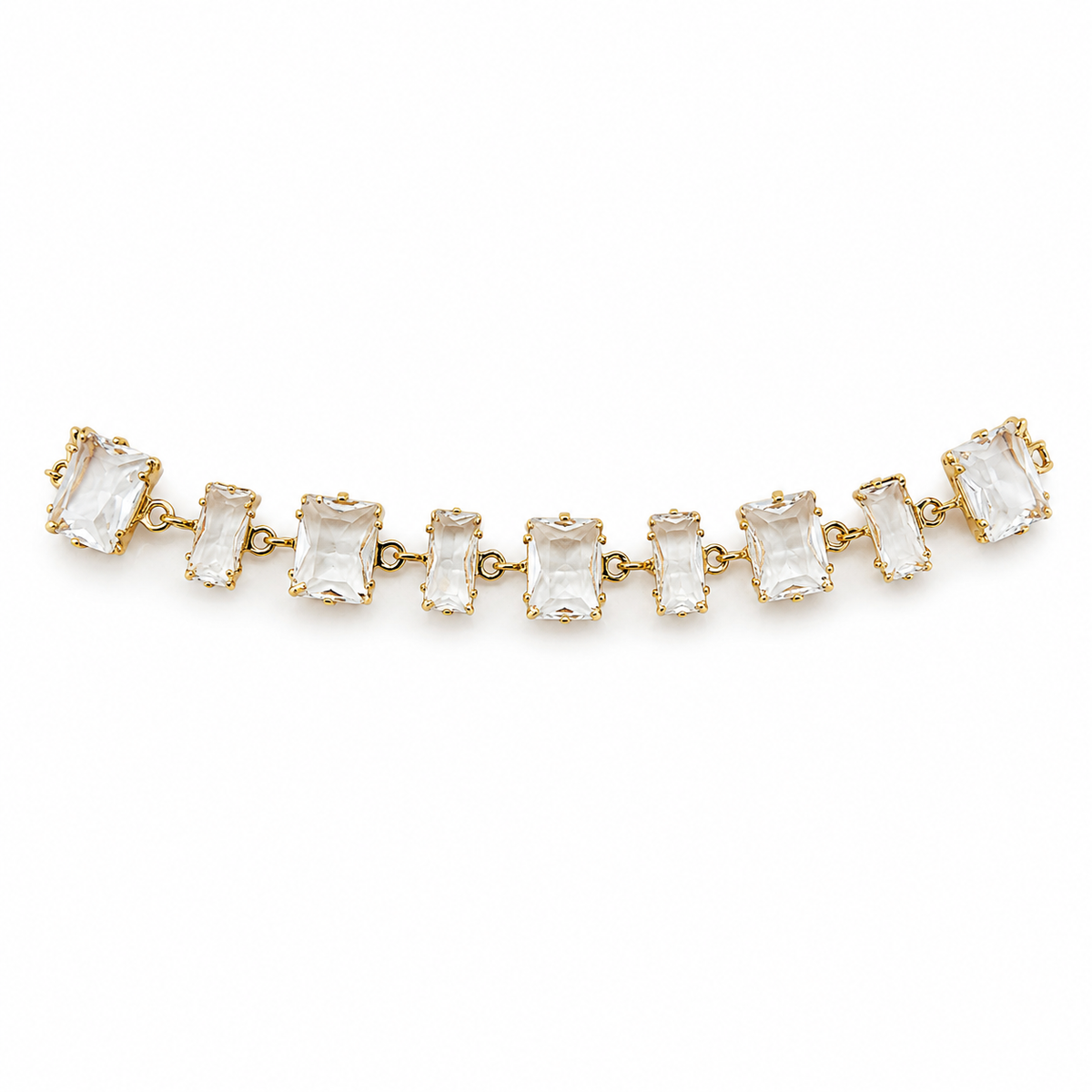 Pulsera con piedras rectangulares transparentes y baño de oro de 18 quilates
