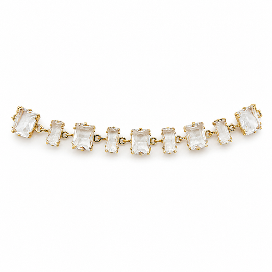 Pulsera con piedras rectangulares transparentes y baño de oro de 18 quilates