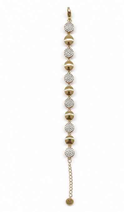 Pulsera dorada con círculos lisos y brillantes